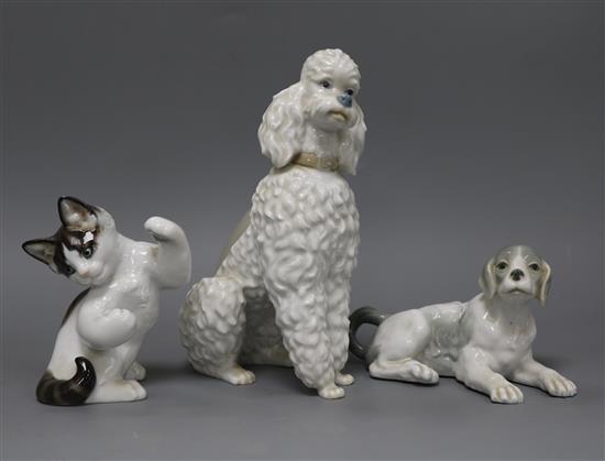 Two Lladro models of dogs and a Rosenthal cat tallest 22cm